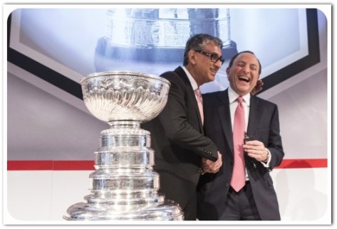 NHL commissioner Gary Bettman has a lot to laugh about as he and Rogers CEO Nadir Mohamed ink a deal that will make them both a lot richer.