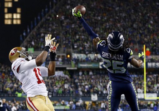 Richard Sherman of the Seahawks makes the most important play of his career, earning Seattle a trip to the Superbowl.